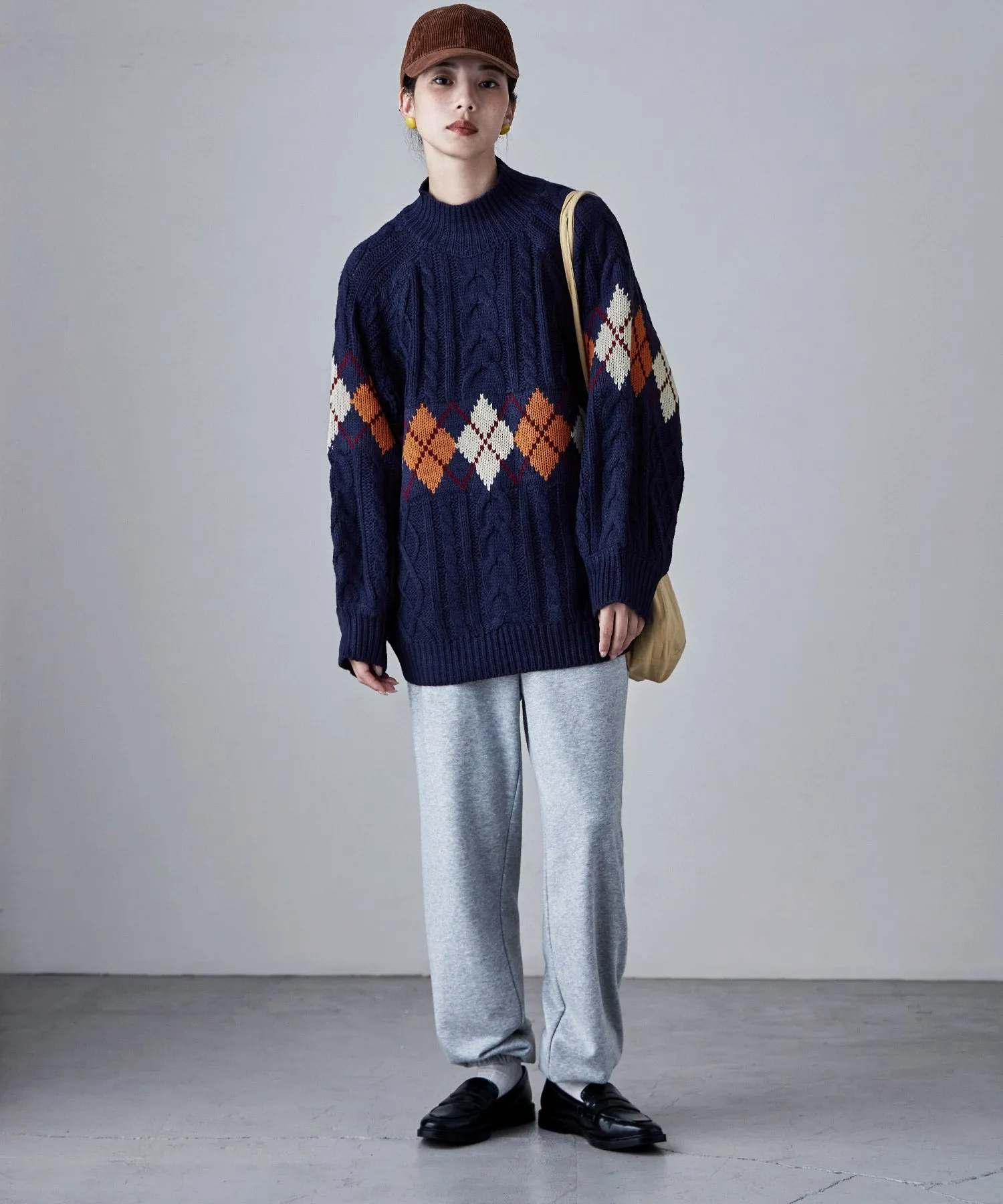 Argyle cable high-neck over knit