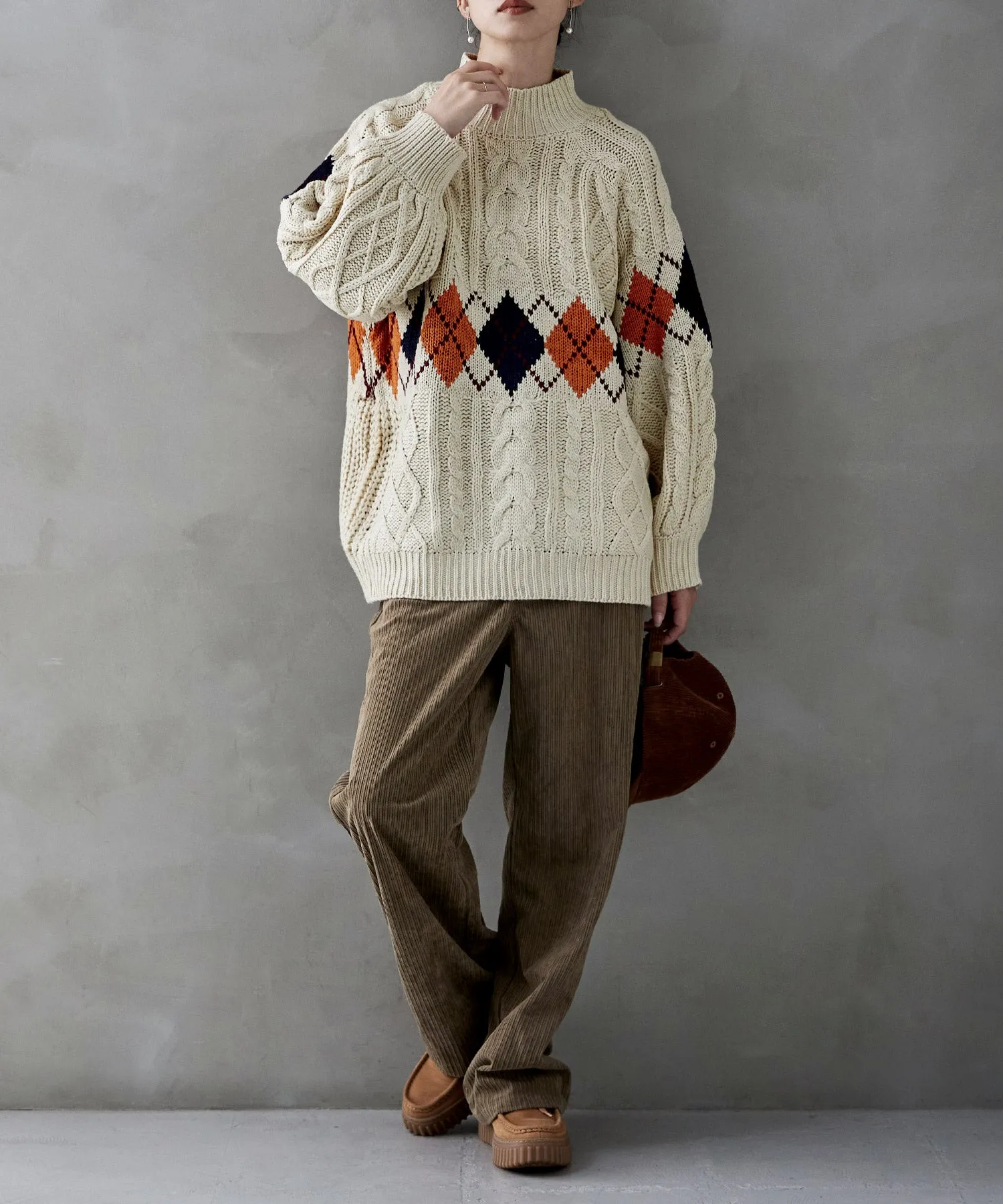 Argyle cable high-neck over knit